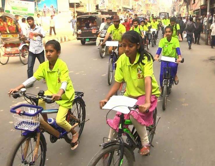 Youth participants join bicycle rally during the conference